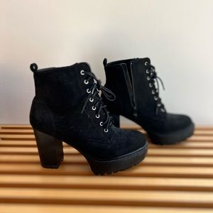 Black heeled combat boots